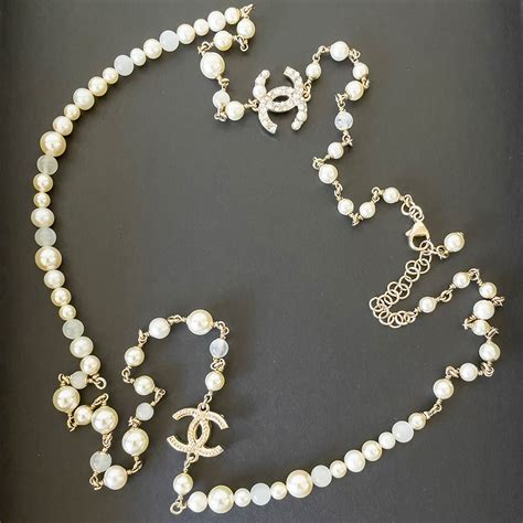 chanel pearl necklace with cc logo replica|chanel cc necklace price.